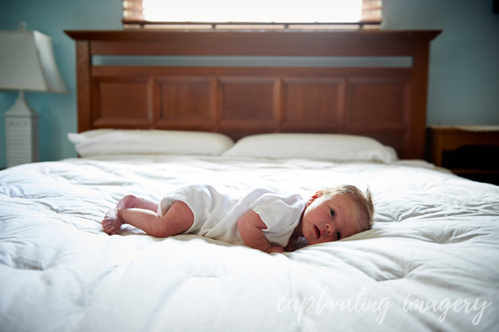 baby on mom and dad's bed