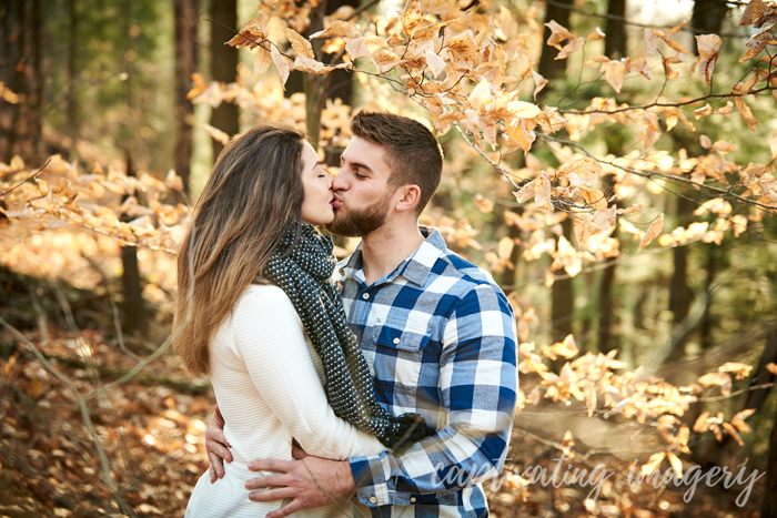 kissing engagement photo