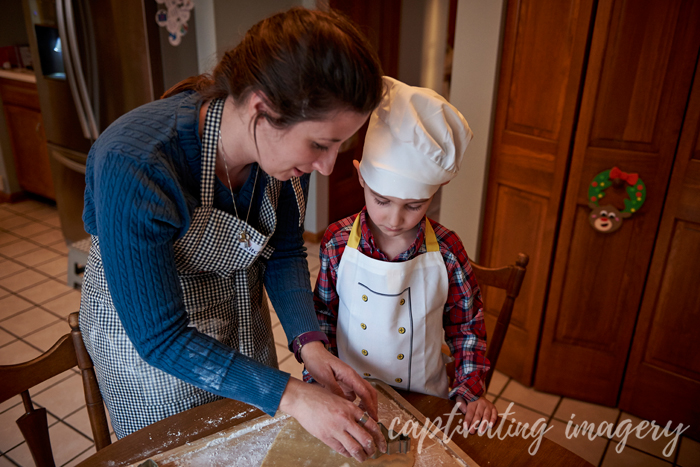 mommy and son cutting out cookies