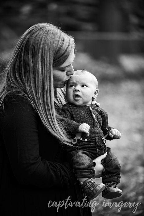 mama kissing baby