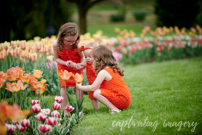 little girls in the tulip garden