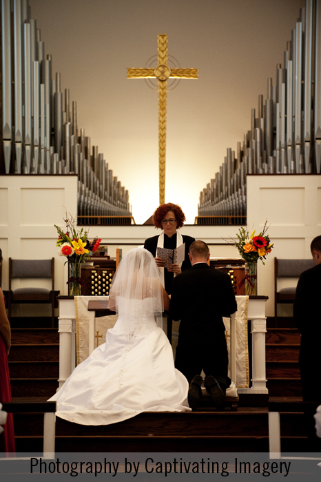 Kneeling at the altar