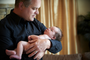 father and newborn son portrait