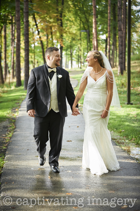 bride and groom hand in hand