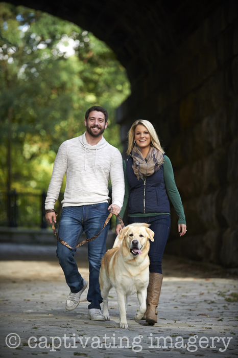 engaged couple and their dog