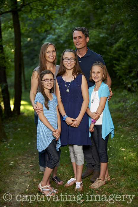 family portrait in woods