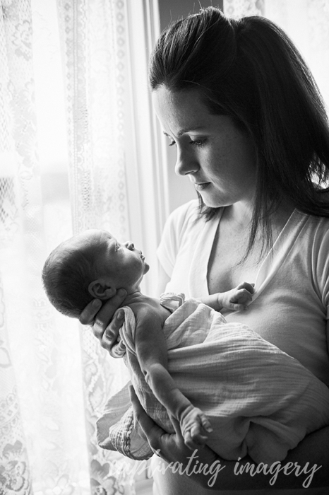 mama and her baby at the window