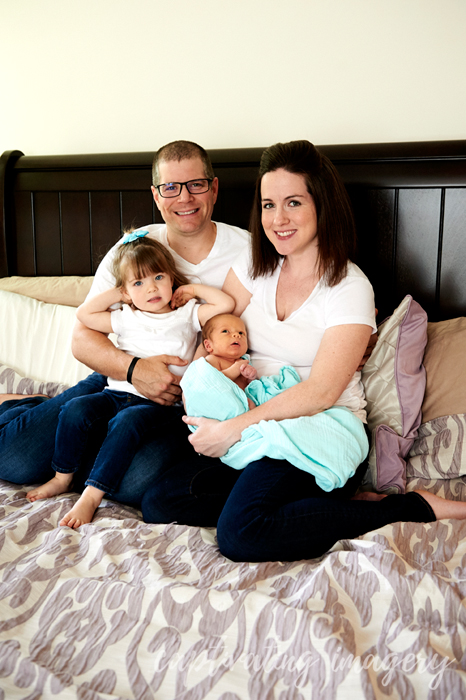 family portrait on the bed