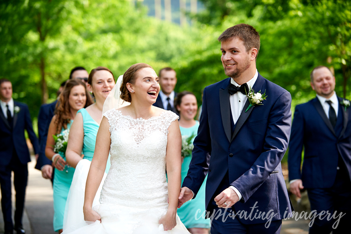 walking with their bridal party