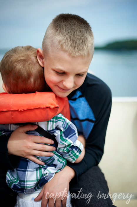 my nephew hugging my littlest