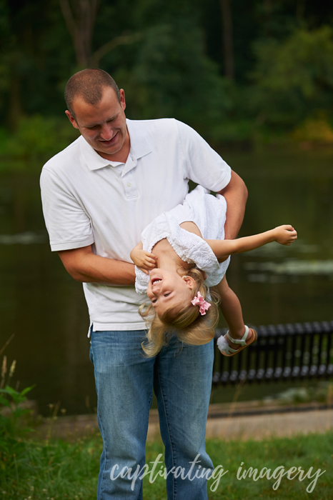 little girl taking a fun break with dad