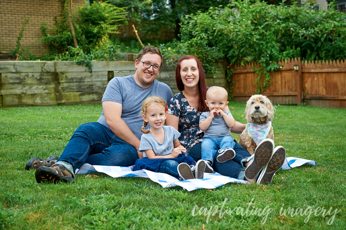 family portrait with their dog