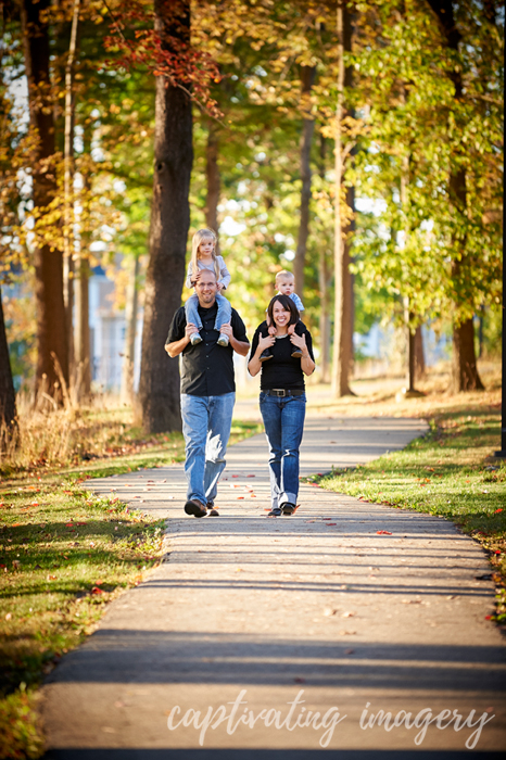 family walking through the park