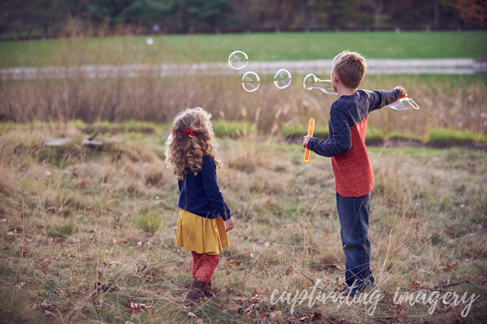 kids blowing bubbles