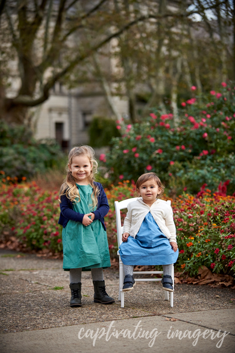 little girls by the garden