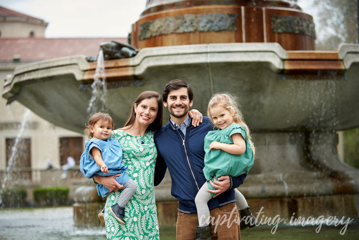 family portrait by the fountain