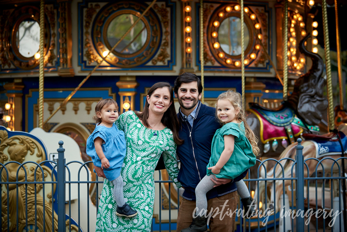 family by the carousel