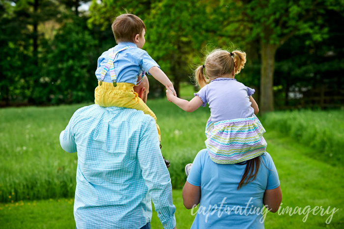 piggy back on mom and dad's shoulders