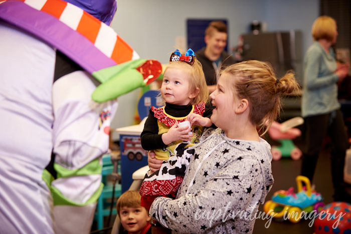 birthday girl meets Buzz Lightyear