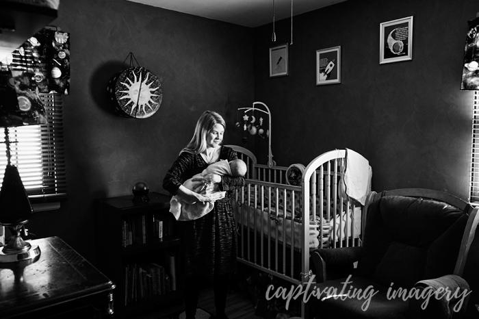 mom and baby in nursery