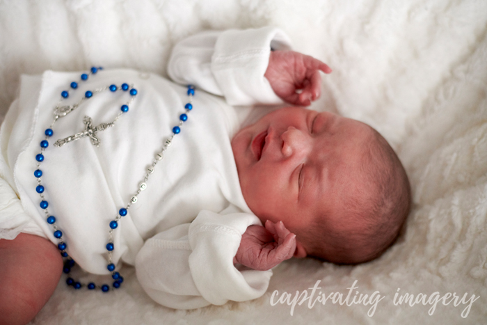 baby with id rosary