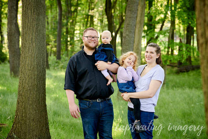 family portrait in the woods