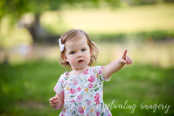 little girl pointing