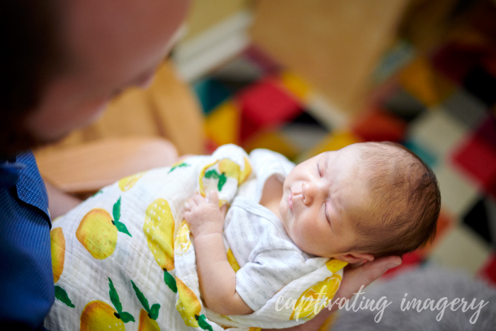 resting in daddy's arms