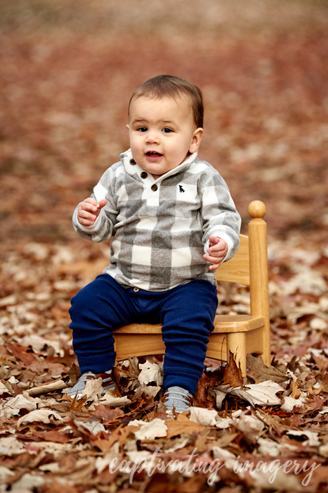 sitting on a tiny chair