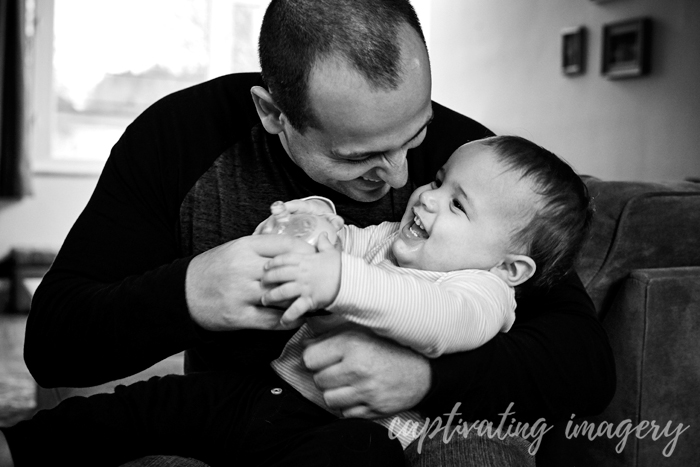 enjoying a laugh with his daddy