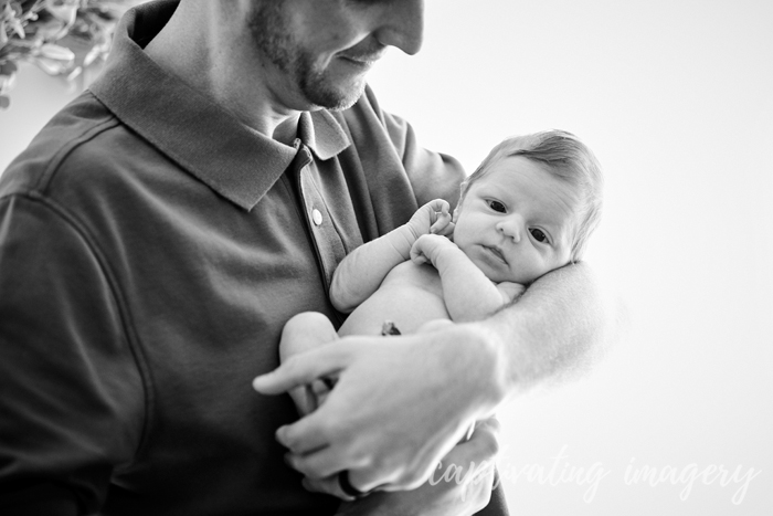 snuggling in dad's arms