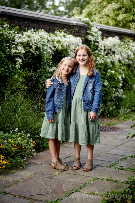 sisters by the walled garden
