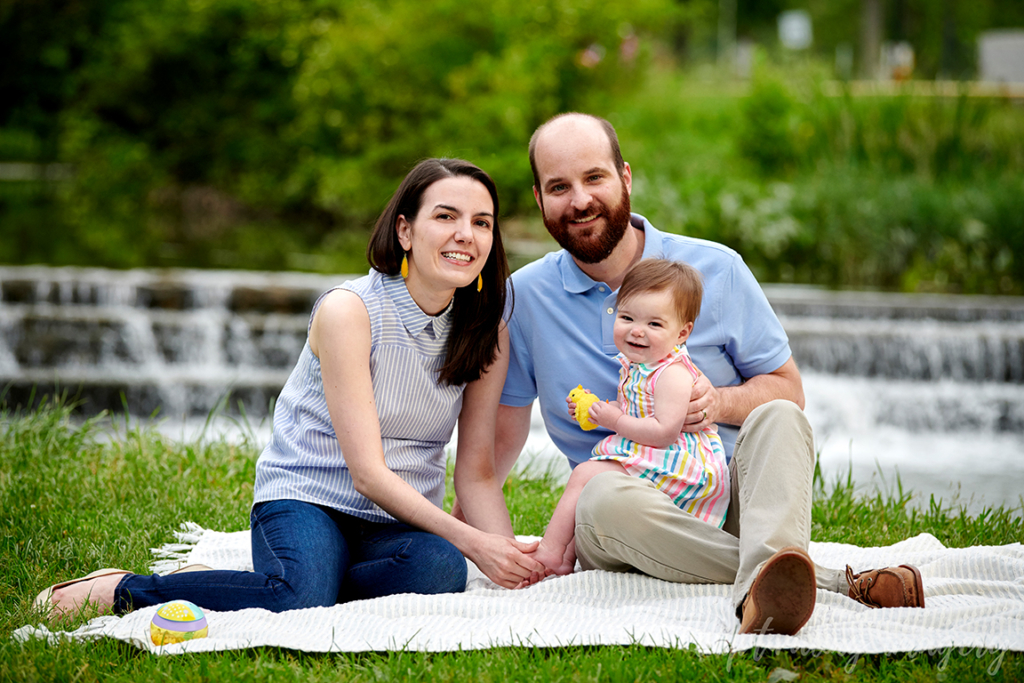 family on picnic blanket