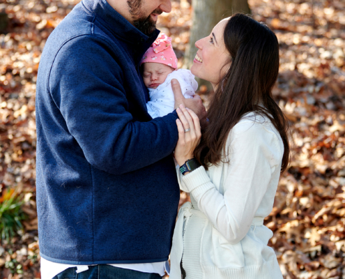 family portrait with fall leaves