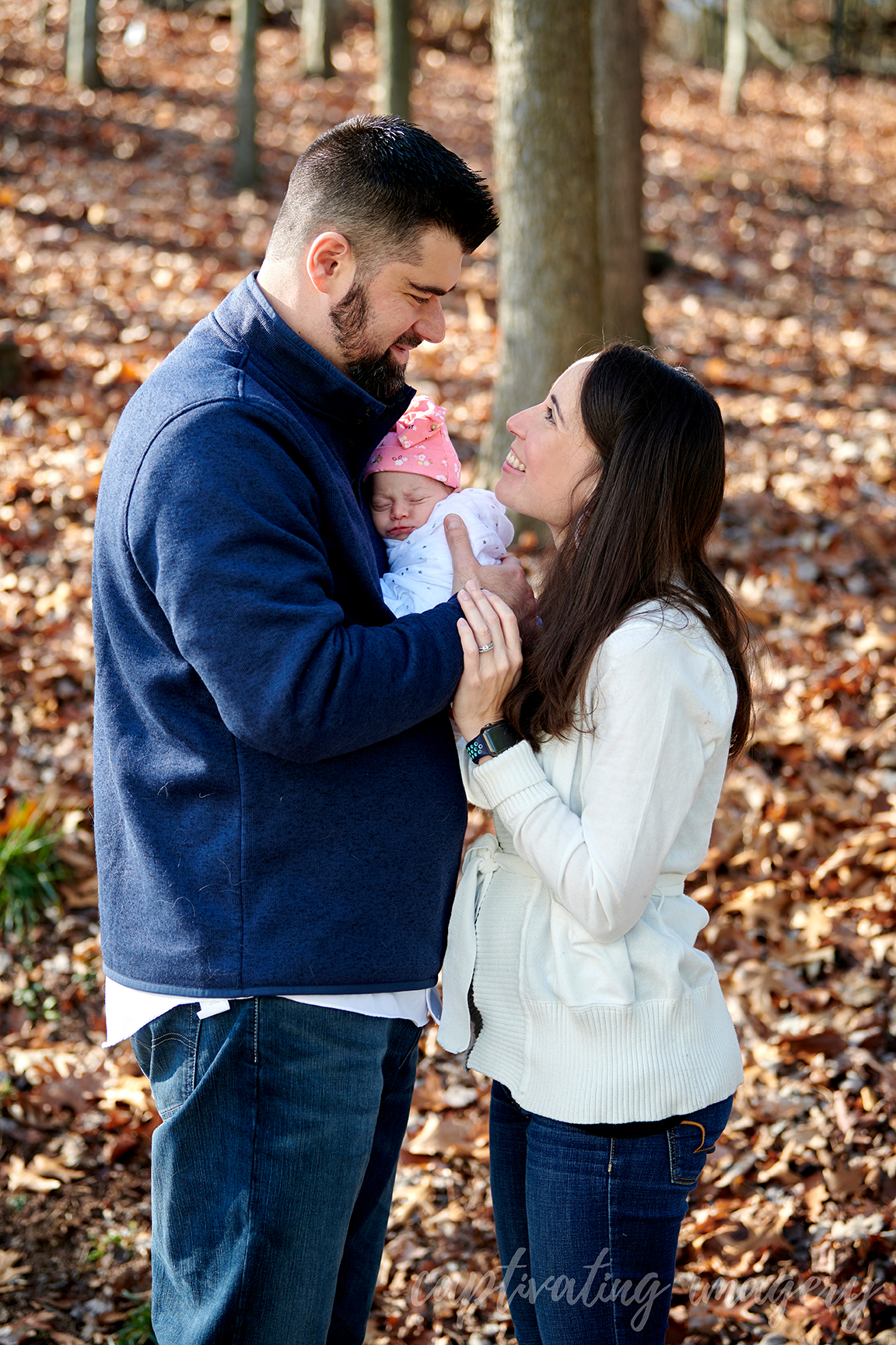 family portrait with fall leaves