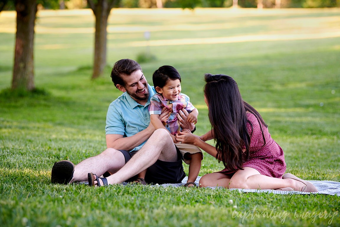 family picnic blanket playtime