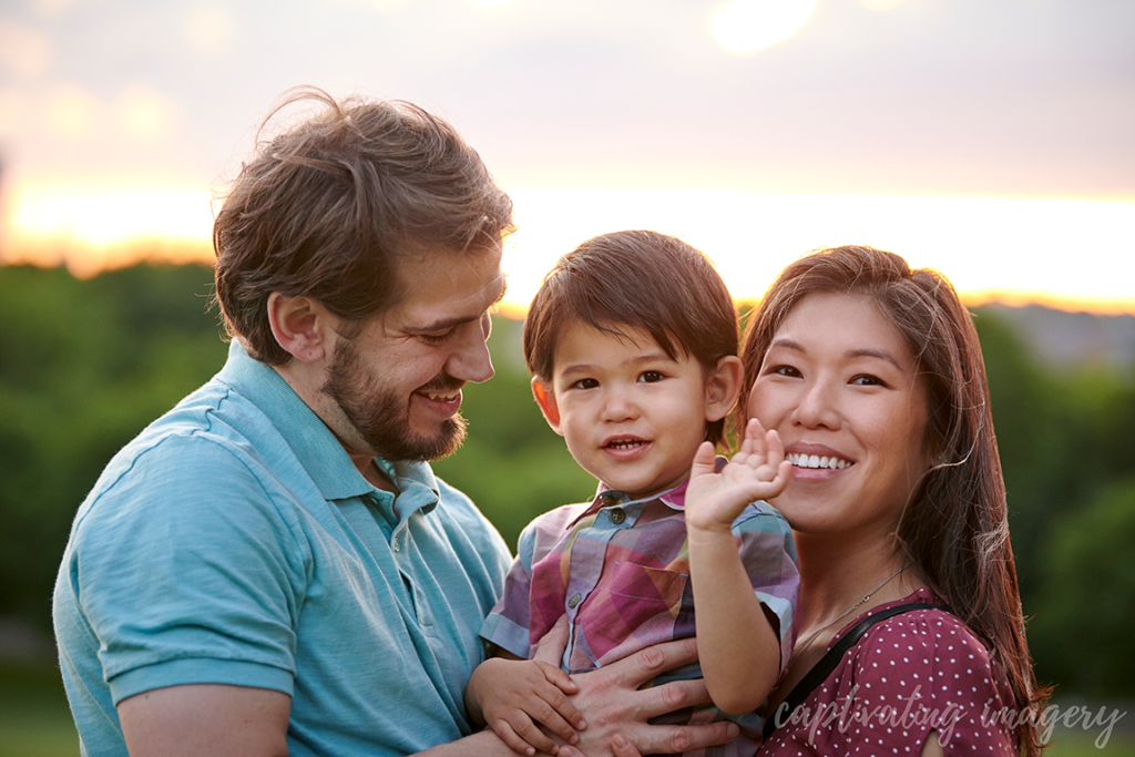 family close up with sunset