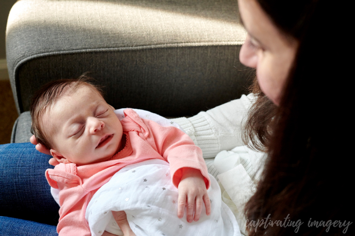 mom holds baby color