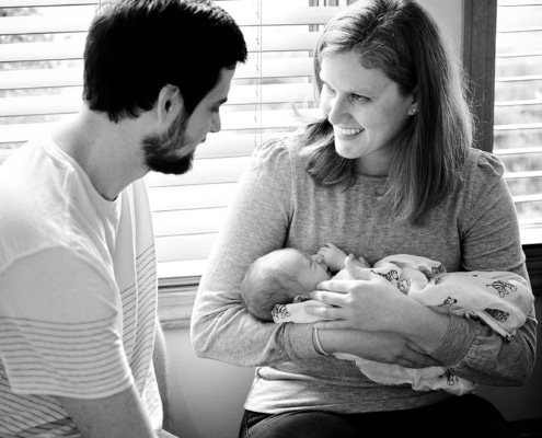 family together on window seat