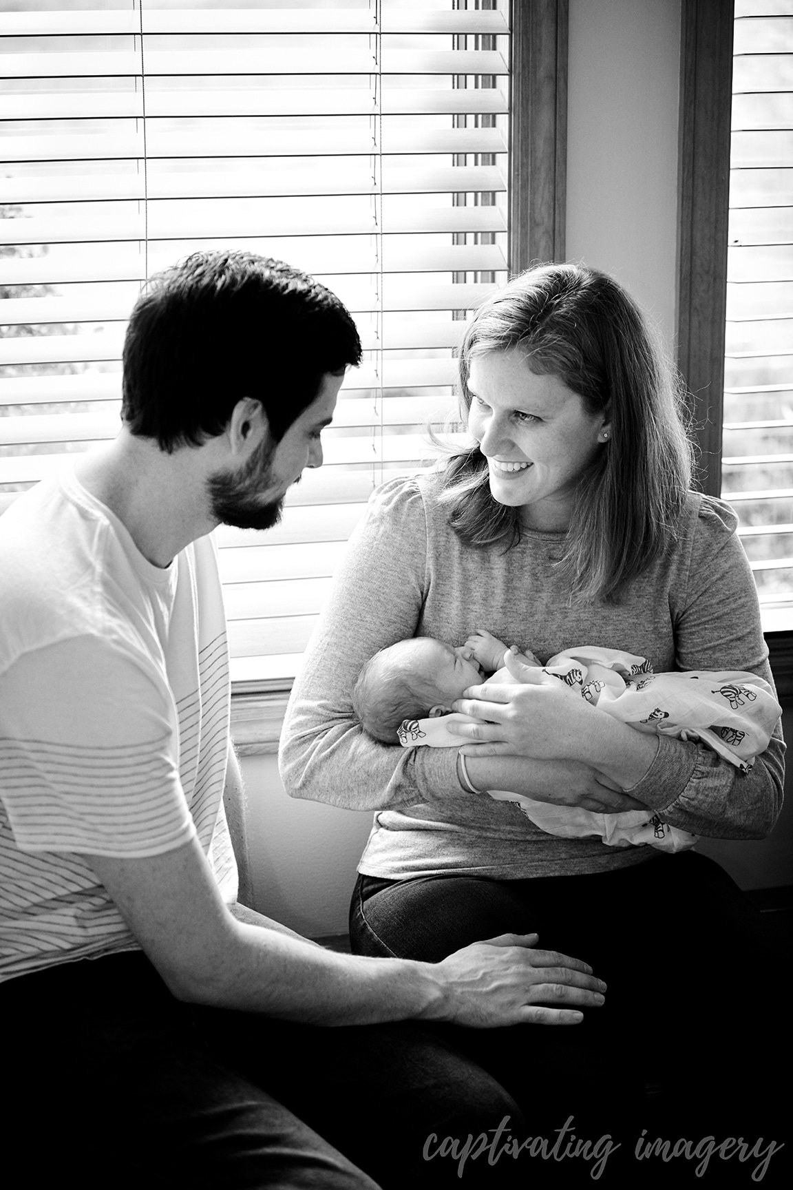 family together on window seat