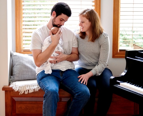 family together on window seat