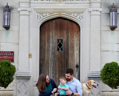 family with dog at Hartwood Acres Mansion