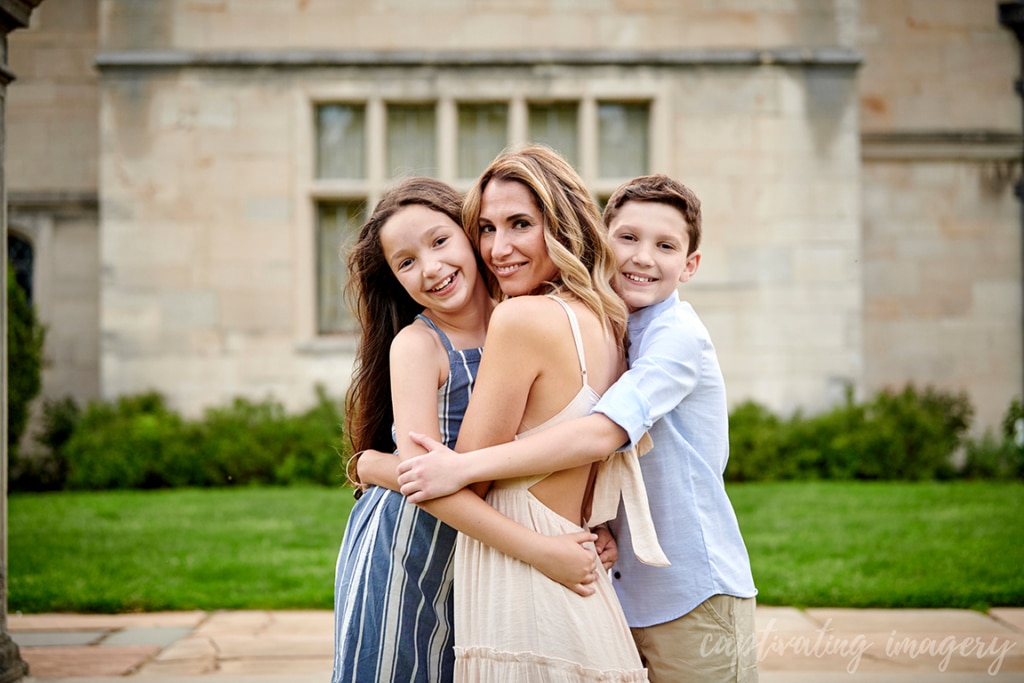 mom and children hug