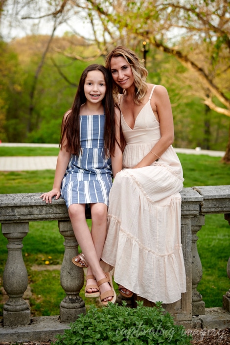 mom and daughter seated