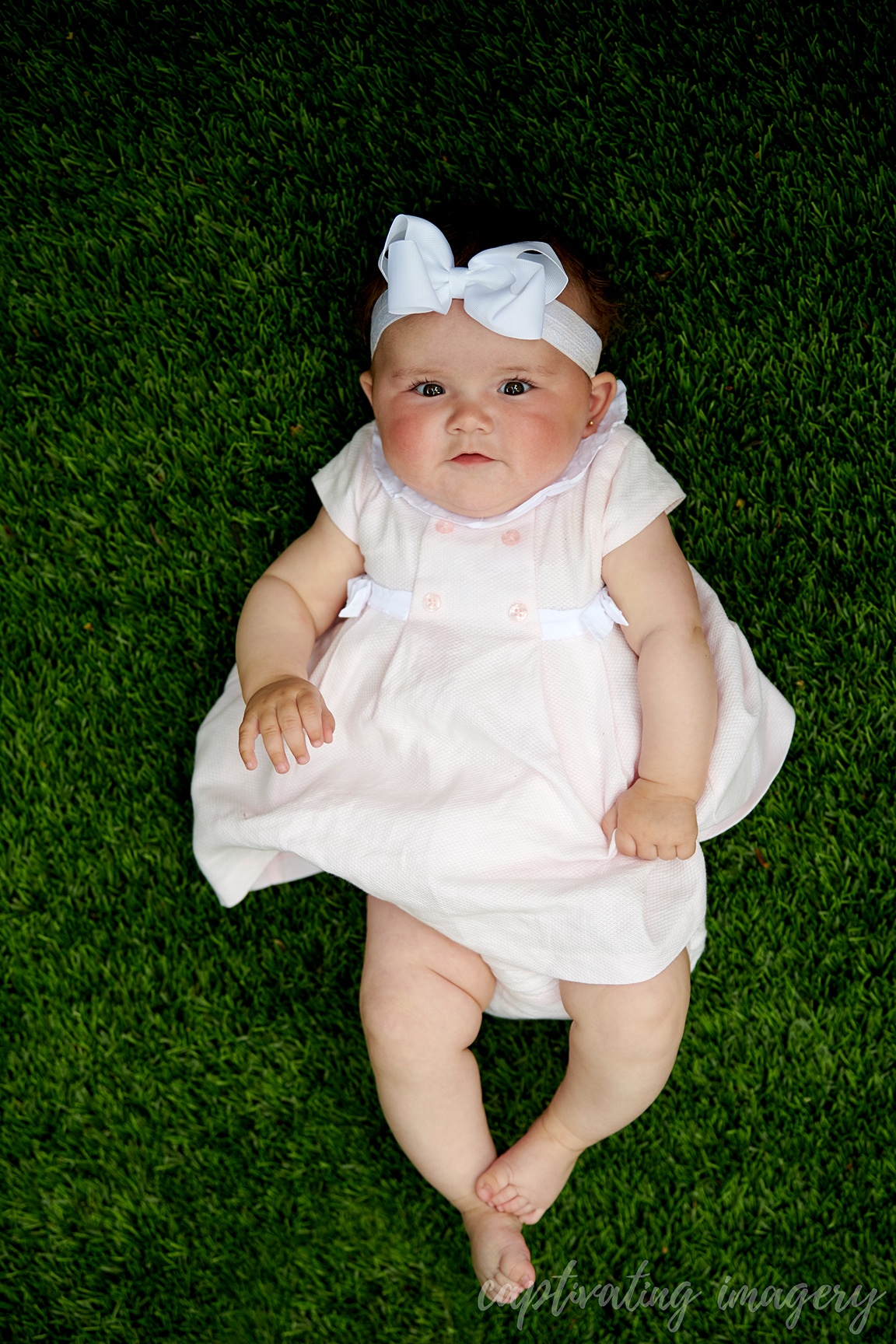 baby girl on grass