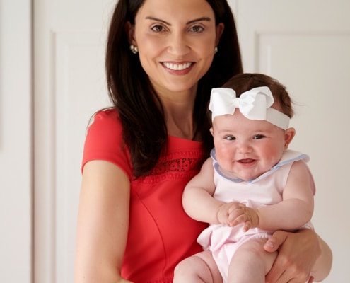 mom and baby smiling