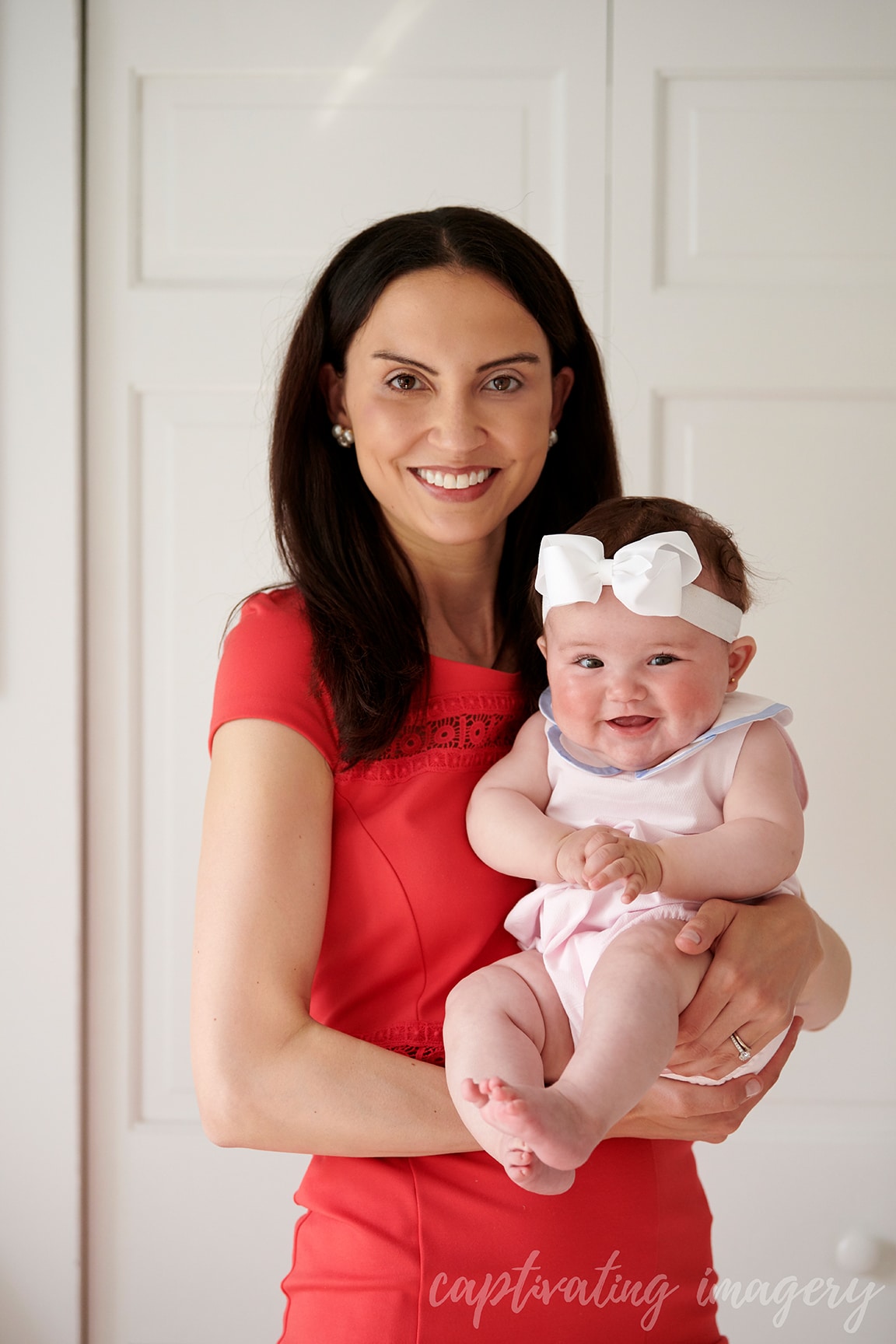 mom and baby smiling