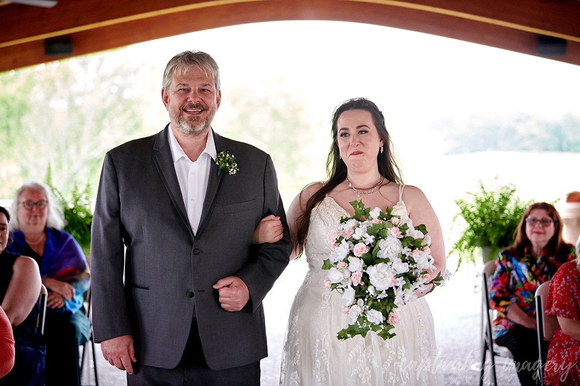 father walks daughter down aisle