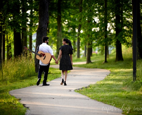 couple walks down path
