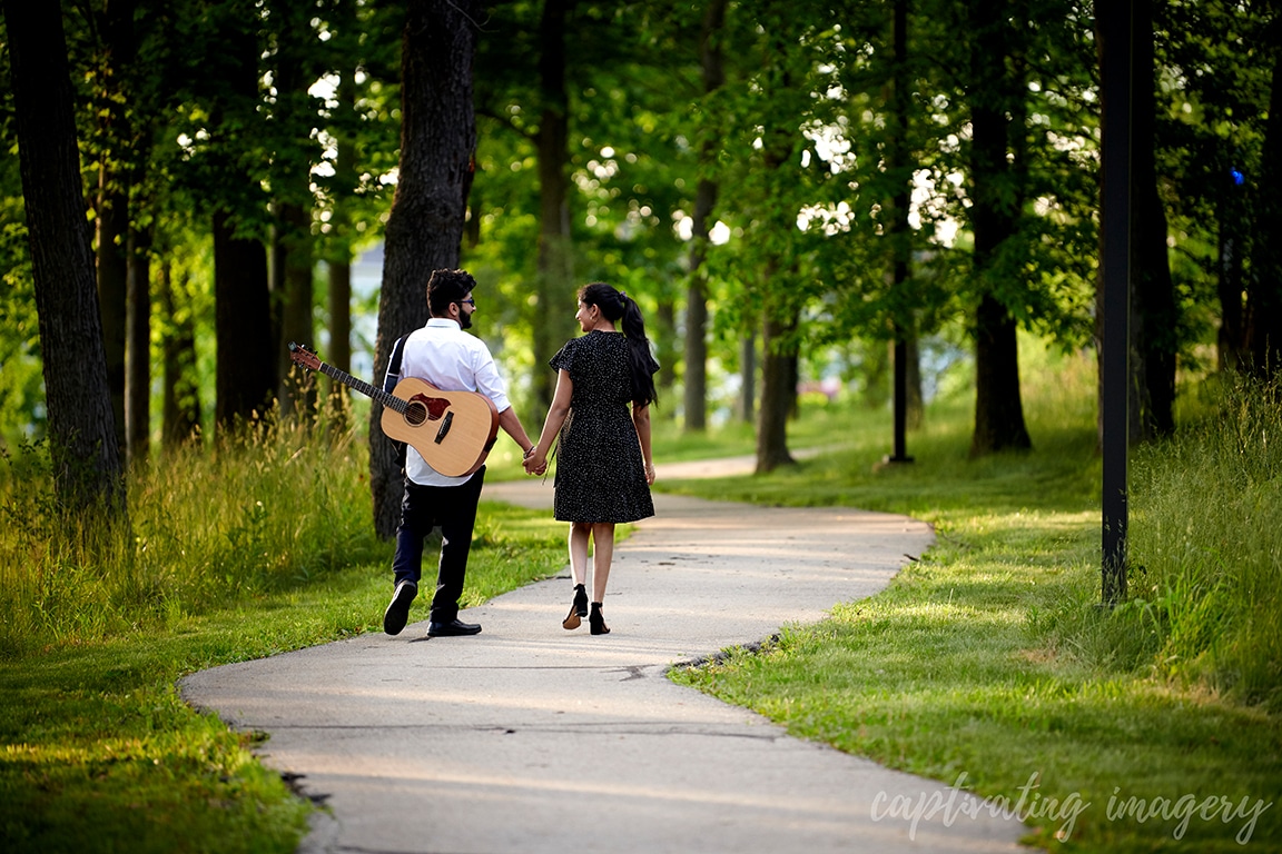 couple walks down path
